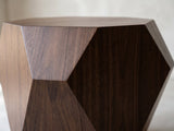 Close-up of the Urbino Acacia Veneer Faceted Coffee Table: the pinched corner facets meeting a pointed side face