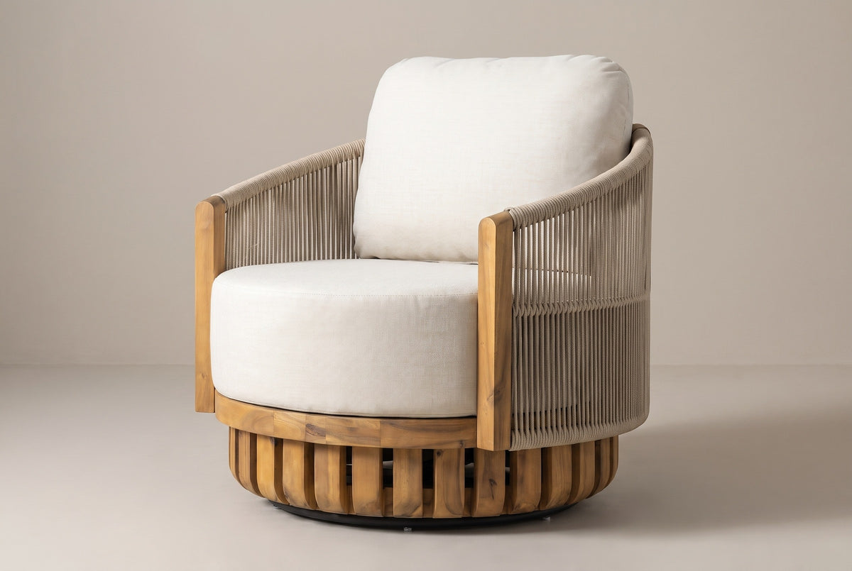 The Ustica acacia and rope swivel lounge chair with light beige cushions, three-quarter view on a light studio backdrop