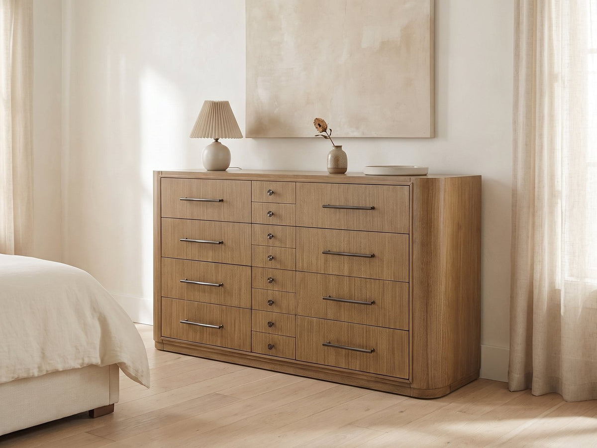 Valdagno 80-Inch Eucalyptus Veneer Dresser against a plaster wall under an abstract canvas in a bright bedroom