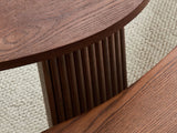 Close-up of the Valenza 50-Inch Freeform Walnut-Stained Veneer Nesting Coffee Tables, Set of 2: a reeded curved-panel leg under the thin veneered top edge