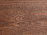 Close-up of the Valenza 50-Inch Freeform Walnut-Stained Veneer Nesting Coffee Tables, Set of 2: the walnut-stained ash veneer grain of the top