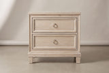 The Villacidro nightstand in pale washed oak, front view on a light studio backdrop