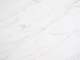 Close-up of the Vitozza White Marble Hexagon Side Table: the soft grey veining of the honed white marble top