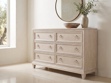 Vittorio 62-Inch Washed Oak 6-Drawer Dresser under a round bronze mirror in a villa bedroom