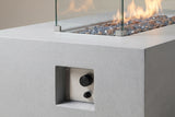 The Vulcano control niche in the long side of the concrete body: a stainless steel plate with one black knob above one black igniter button