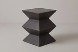 The Zafferana charcoal bronze geometric concrete side table, corner view on a light studio backdrop