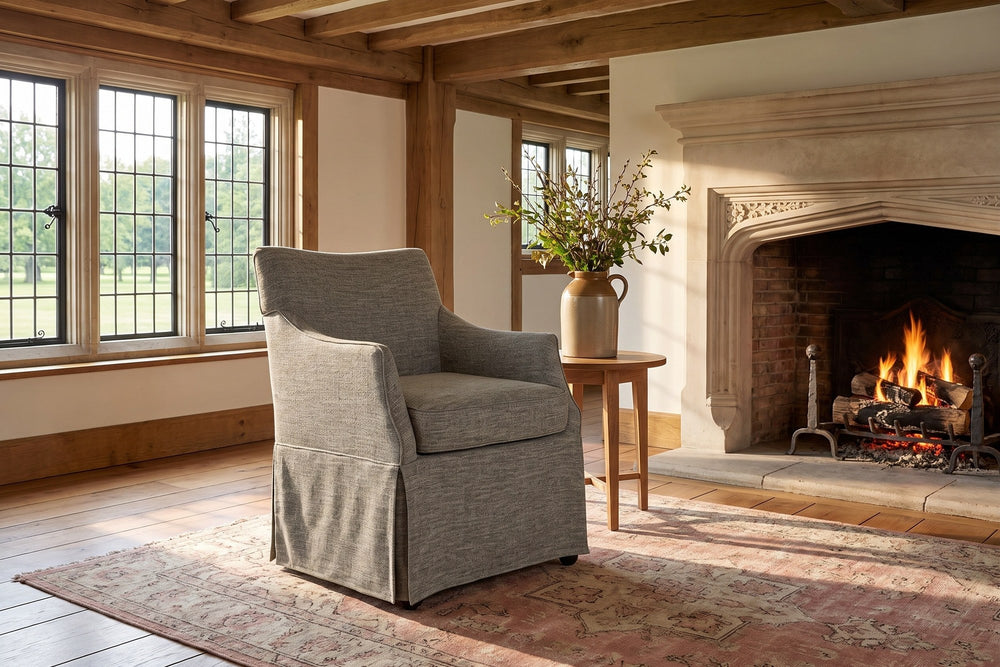 Zagarise Hidden-Caster Skirted Upholstered Dining Chair in an English country dining room