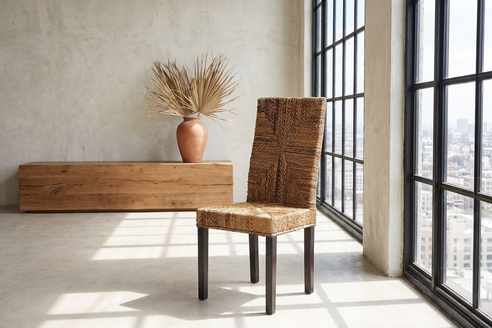 Zambrone Woven Natural Fiber Parsons Dining Chair in a city loft