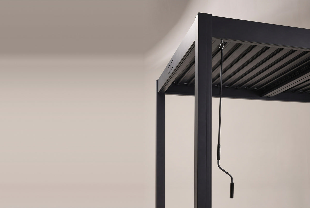 The crank rod of the Zingaro pergola hooked under the roof edge at one corner post