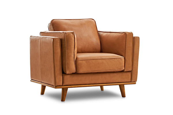 A single - seater leather armchair made of premium Italian Nappa 11000 leather, with a sturdy alder wood frame, high - resilience foam/fiber cushions and removable covers, featuring a blend of contemporary and mid - century modern style.