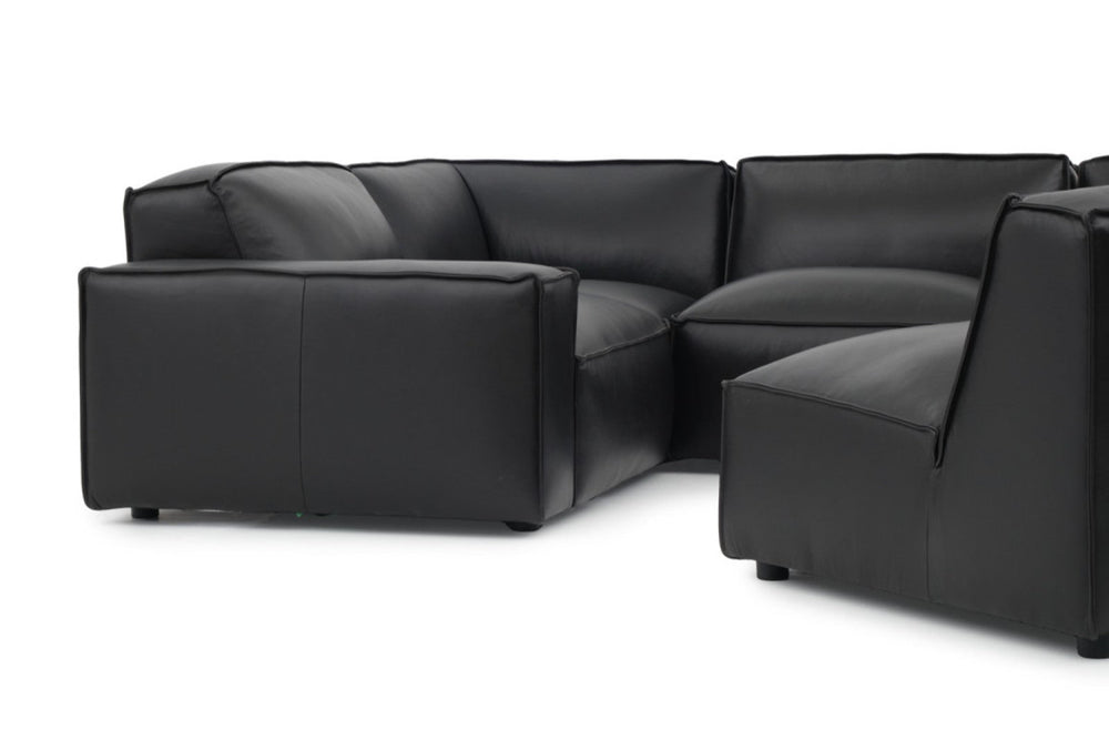 Left Angled Front Close-Up View of A Modern, Black, Four Seats, Full Top Grain Leather Modular Sofa with a Single Adjust Sofa on a White Background.